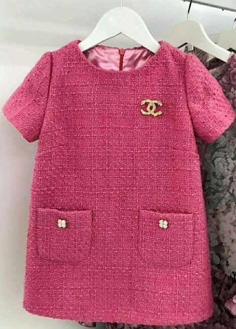Children's pink tweed dress with CC logo and front pockets
